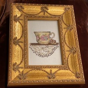 Gold tone sparkling gold frame with cross stitch
